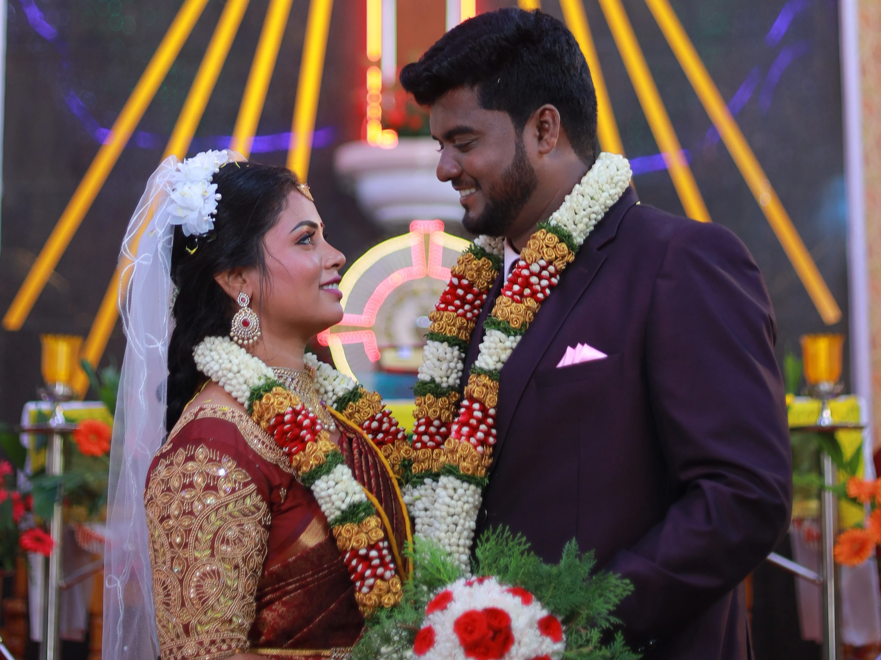 RJ Photography capturing elegant wedding moments with bride, groom, and stunning decor